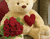 Aranyos Bear és vörös rózsa