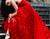 Γυναίκα Ένα κόκκινο φόρεμα