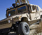 Military Hummer On Desert
