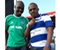 Ben Kitili In Blue With Larry Madowo In Green