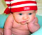 bayi dengan topi