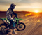 Motocikls Sand Dunes Sunset
